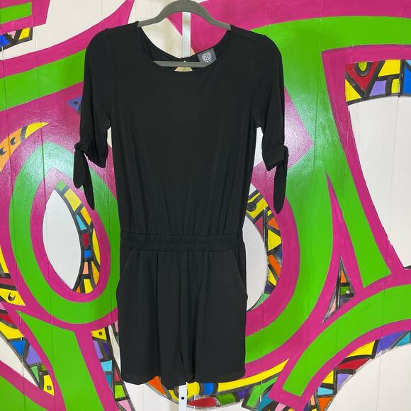 Vince Camuto Pants - Vince Camuto, Black Romper with pockets. Size XS. In excellent condition!